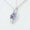 Graduated Lab-Created Blue Sapphire Beaded Swirl Ribbon Three Stone Pendant in Sterling Silver