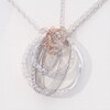 0.18 CT. T.W. Diamond Infinity Heart and Double Circle Pendant in Sterling Silver and 10K Rose Gold