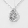 0.29 CT. T.W. Diamond and Textured Teardrop Pendant in 10K White Gold