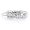 0.69 CT. T.W. Diamond Double Frame Twist Bridal Set in 10K White Gold