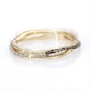 0.115 CT. T.W. Enhanced Black and White Diamond Reversible Crossover Band in 10K Gold