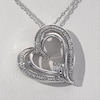 Diamond Accent Tilted Double Heart Outline Pendant in Sterling Silver