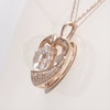 10.0mm Lab-Created White Sapphire and 0.08 CT. T.W. Diamond Heart Pendant in 10K Rose Gold