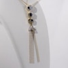 Lab-Created Blue Sapphire and 0.04 CT. T.W. Diamond Three Stone Tassel Pendant in Sterling Silver with 14K Gold Plate