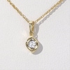 CT. T.W. Diamond Channel-Set Solitaire Twist Flame Pendant and Stud Earrings Set in 10K Gold