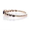 Lab-Created Blue Sapphire and 0.04 CT. T.W. Black Diamond Marquise Side Accent Promise Ring in 10K Rose Gold