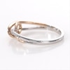 0.116 CT. T.W. Diamond Loop Split Shank Ring in Sterling Silver and 10K Rose Gold