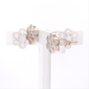 0.18 CT. T.W. Diamond Bezel-Set Flower Stud Earrings in 10K Rose Gold