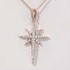 0.115 CT. T.W. Diamond Eight-Point Star Pendant in 10K Rose Gold