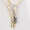 0.085 CT. T.W. Enhanced Black and White Diamond Double Matchstick Pendant in Sterling Silver and 14K Gold Plate