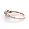 0.145 CT. T.W. Diamond Frame Split Shank Promise Ring in 10K Rose Gold