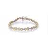 0.115 CT. T.W. Diamond "X" Link Bracelet in Sterling Silver and 10K Gold