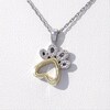 0.04 CT. T.W. Diamond Paw Print Pendant in Sterling Silver and 10K Gold