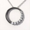 0.45 CT. T.W. Journey Diamond Circle Pendant in 10K White Gold and Black Rhodium