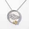 Cursive "Mom" and Paw Print Circle Frame Pendant in Sterling Silver and 10K Gold