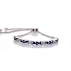 Lab-Created Blue Sapphire and 0.065 CT. T.W. Diamond Three Stone "X" and "O" Bolo Bracelet in Sterling Silver - 9.5"