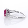 Tilted 7.0mm Cushion-Cut Lab-Created Ruby and 0.065 CT. T.W. Diamond Frame Bypass Ring in Sterling Silver