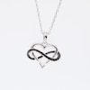 0.145 CT. T.W. Black Diamond Infinity Wrapped Heart Pendant in Sterling Silver