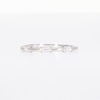 0.085 CT. T.W. Baguette Diamond Three Stone Anniversary Band in 10K Gold