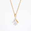 0.20 CT. T.W. Pear-Shaped Multi-Diamond Twist Bail Pendant in 10K Gold