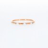 0.07 CT. T.W. Baguette Diamond Three Stone Anniversary Band in 10K Rose Gold