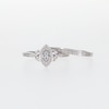 0.23 CT. T.W. Marquise-Shaped Multi-Diamond Frame Leaf-Sides Ribbon Shank Bridal Set in Sterling Silver