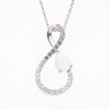 Pear-Shaped Lab-Created Opal and White Lab-Created Sapphire Infinity Ribbon Pendant in Sterling Silver