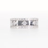 0.69 CT. T.W. Diamond Edge Center Station Band in 10K Gold