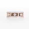 0.69 CT. T.W. Diamond Edge Center Station Band in 10K Rose Gold