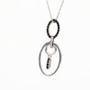 0.20 CT. T.W. Black and White Diamond Oval Drop Pendant in Sterling Silver