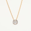 CT. T.W. Multi-Diamond Flower Pendant in 10K Gold