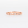 0.04 CT. T.W. Diamond "X" Flower Station Stackable Band in 10K Rose Gold