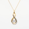 0.25 CT. T.W. Diamond Swirl Infinity Symbol Pendant in 10K Gold