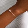 6.0mm Heart-Shaped Pink and White Mother-of-Pearl Frame Reversible Bracelet in 14K Gold - 7.25"