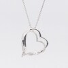 Circle of Gratitude® Collection 0.05 CT. T.W. Diamond Twist Tilted Double Heart Pendant in Sterling Silver - 19"