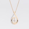 Unstoppable Love™ 0.10 CT. T.W. Diamond Swirl Ribbon Teardrop Pendant in 10K Gold - 19"