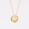 0.30 CT. T.W. Multi-Diamond Swirl Circle Pendant in 10K Gold