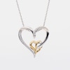 0.085 CT. T.W. Diamond Intertwined Double Heart Pendant in Sterling Silver and 10K Gold