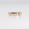 0.085 CT. T.W. Diamond Five Stone Buckle Anniversary Band in 10K Two-Tone Gold