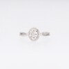 0.20 CT. T.W. Oval Multi-Diamond Frame Split Shank Promise Ring in Sterling Silver